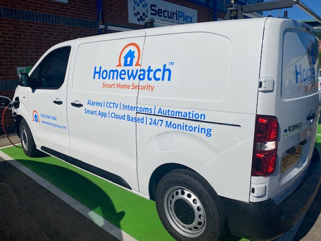 homewatch branded white van